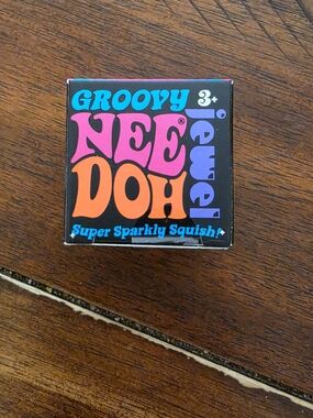 NEE DOH Groovy Jewel Super Sparkly Squish - Black & Pink Packaging